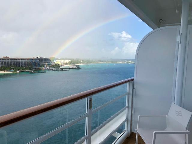 Greeted by rainbows as I sailed into Nassau! 🚢🌈🇧🇸 #nassau #nassaubahamas #bahamas #cruise #disneycruise #dcl #disneycruiseline #disneywish #fotogenictravel #verandah #verandahlife #cruiselife #rainbow #rainbows